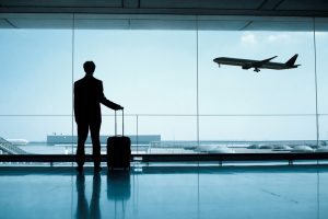 Man at Airport Waiting for Flight