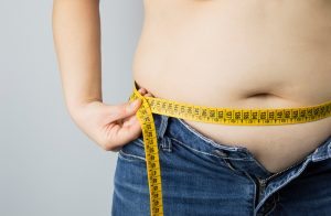 Person Measuring their Waist