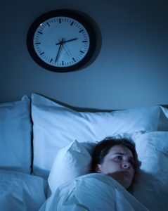 Woman in Bed Can't Sleep